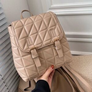 Tan Quilted Leather Backpack with Buckle Closure